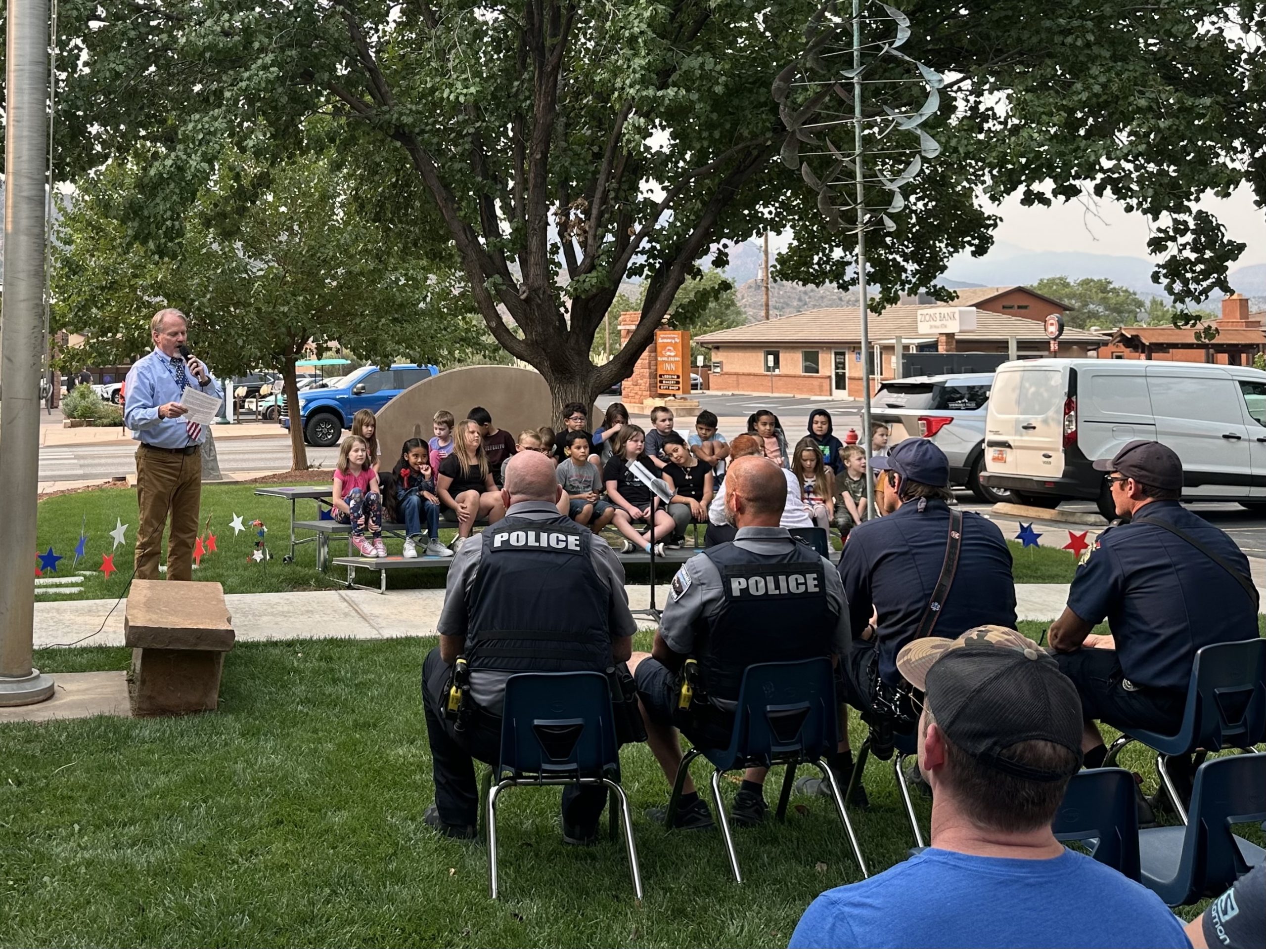 Teacher talking at Hero Day Program on 9/11 for First Responders.