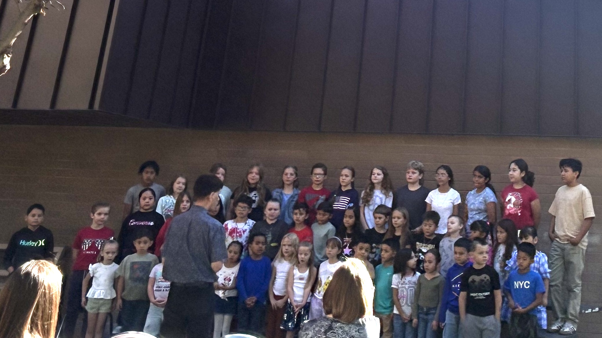 Students singing "Peace In Our TIme" for First Responders on Hero Day.