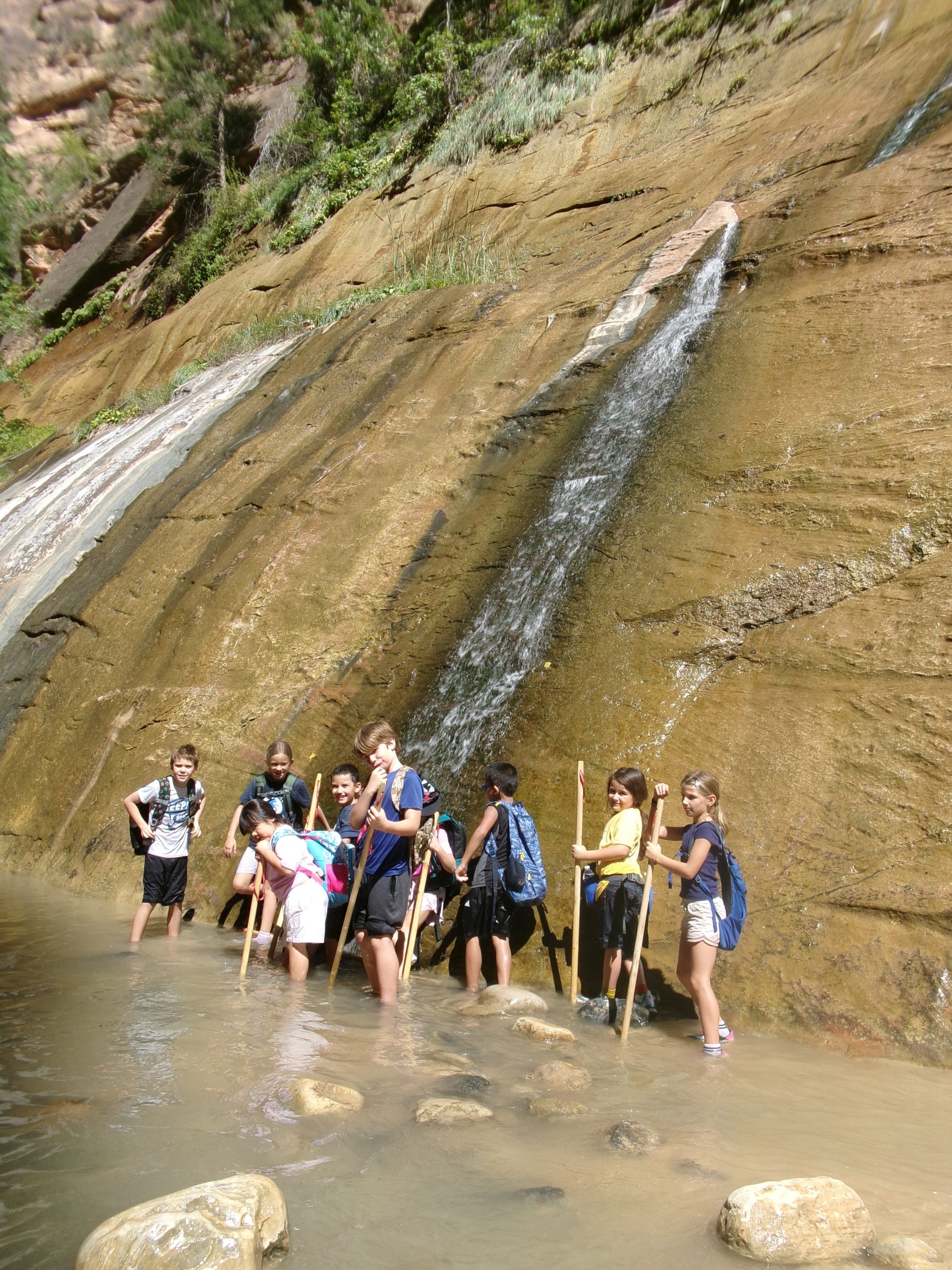 Students hiking the Narrows during Adventure Club