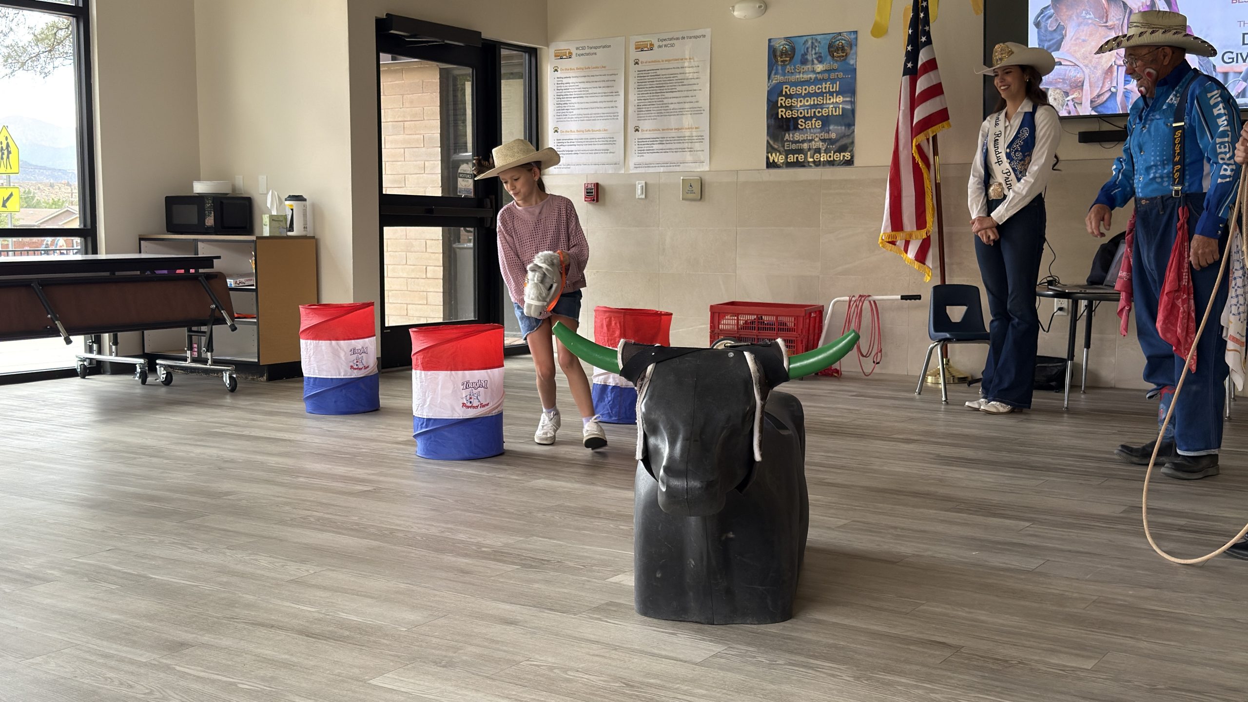 Student barrel racing at the Dixie Roundup Assembly.